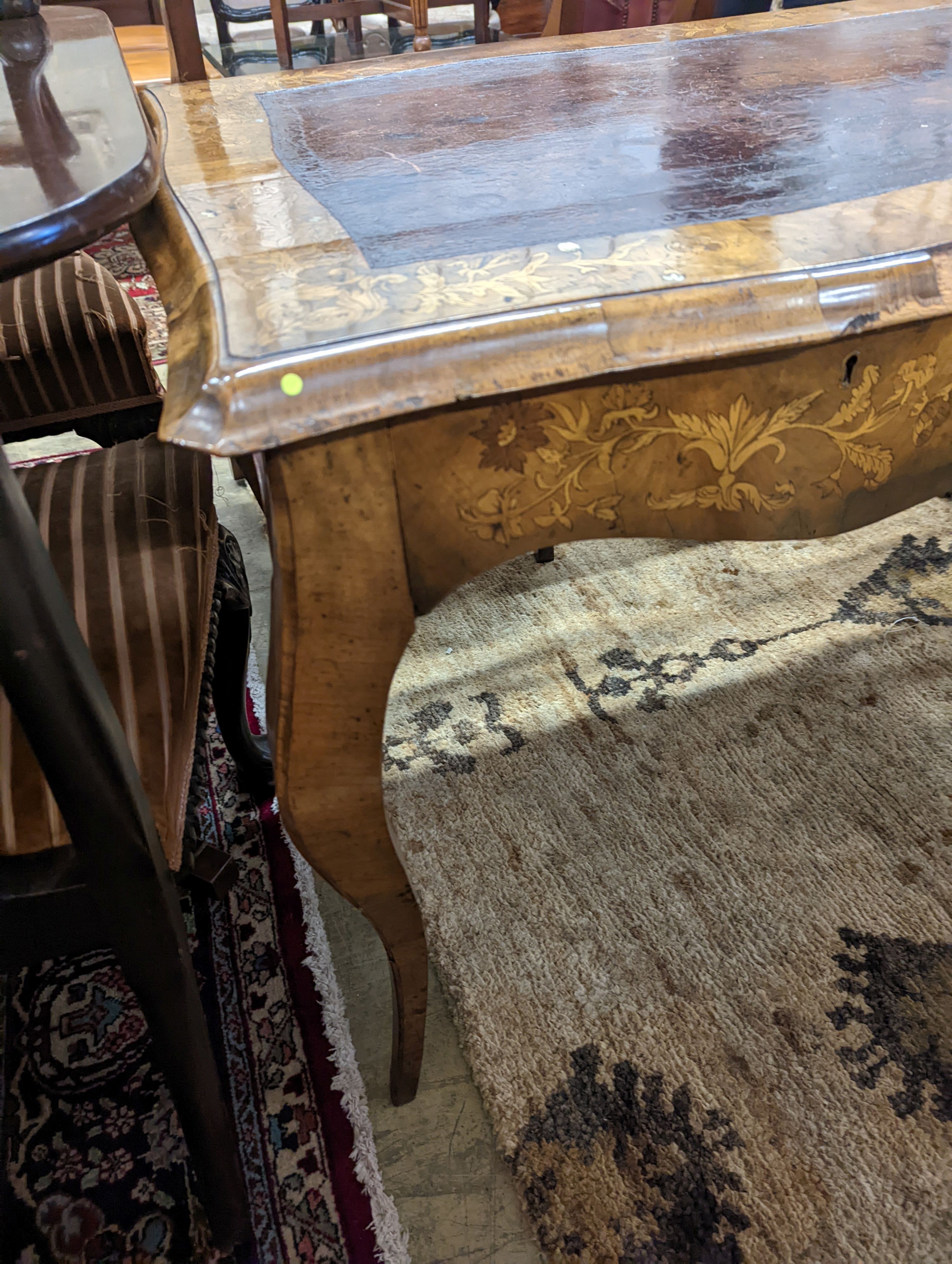 A 19th century mother of pearl and marquetry inlaid writing table, width 120cm, depth 65cm, height 73cm